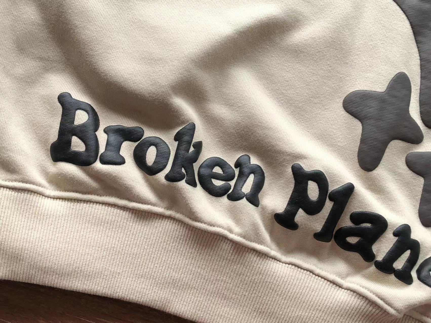 Broken Planet Hoodie "alone but not lonely"